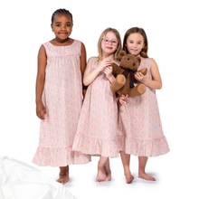 Load image into Gallery viewer, Girls in soft cotton nighties made from liberty floral fabric