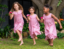 Load image into Gallery viewer, Girls wearing bright pink floral nostalgic nightgowns.
