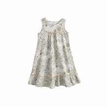 Load image into Gallery viewer, A sleeveless cotton nightie made from Liberty cotton with Christmas stars on a cream background and gold trim.
